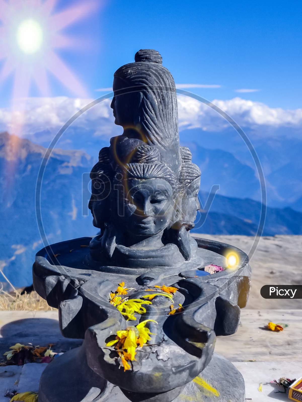 Beautiful macro photography on top of the mountains statue of shiva
