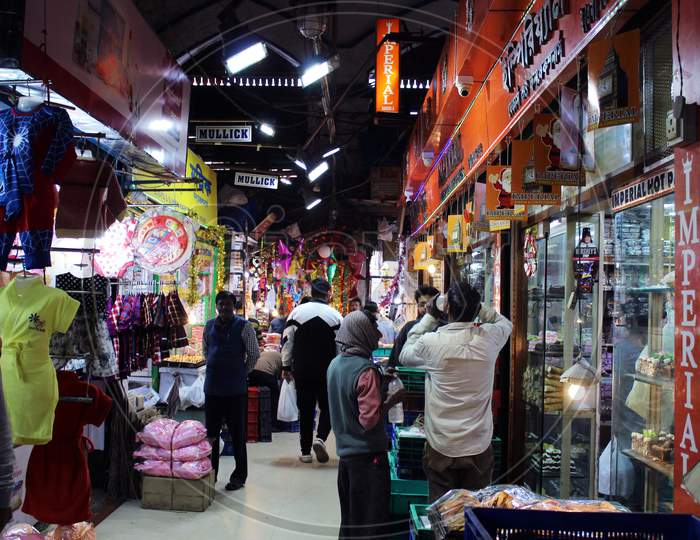 Variety of open shops for selling variety of daily needs at a busy market, at Esplanade, Kolkata.