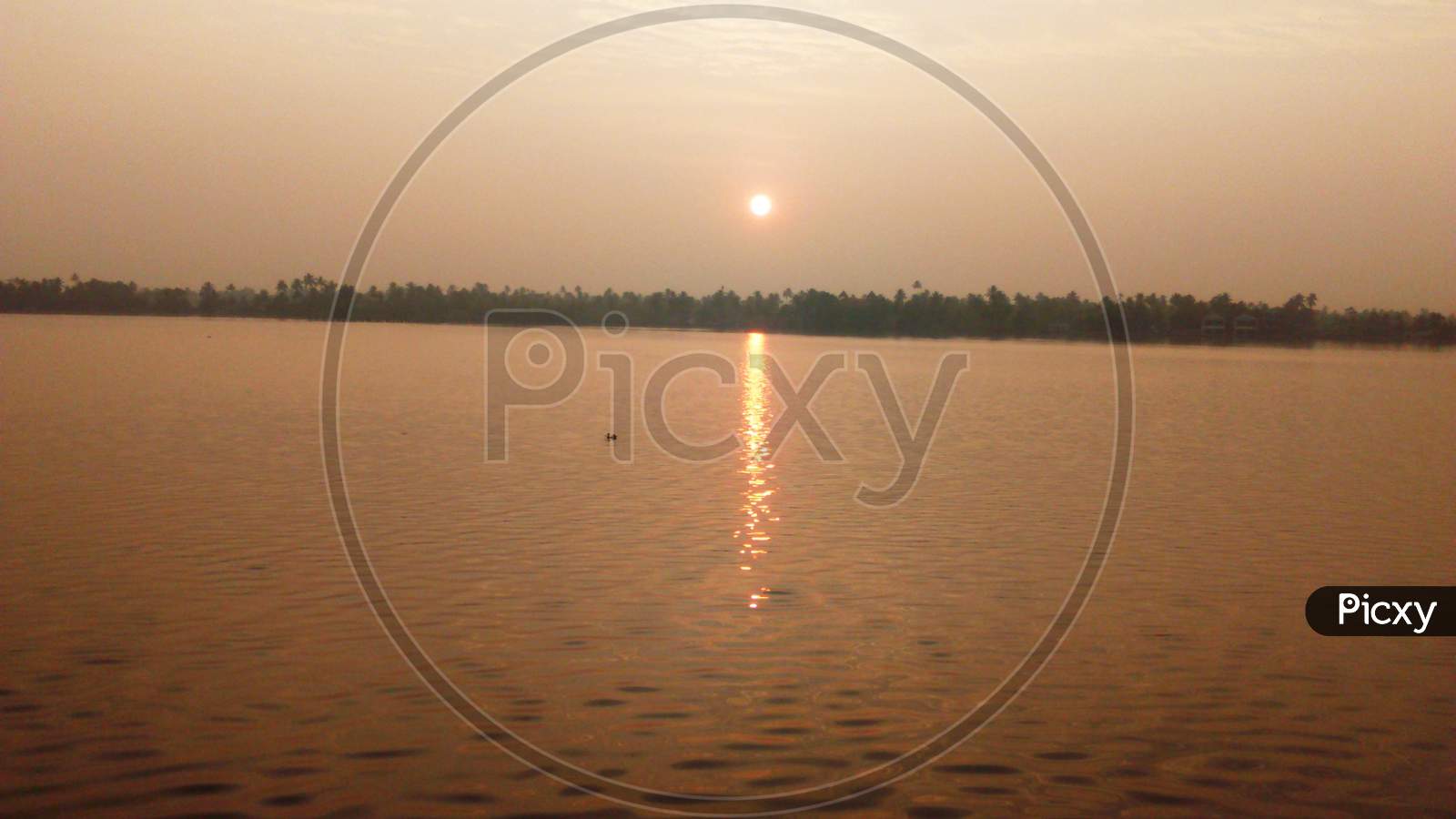 view of sunset in the backwaters of kerala