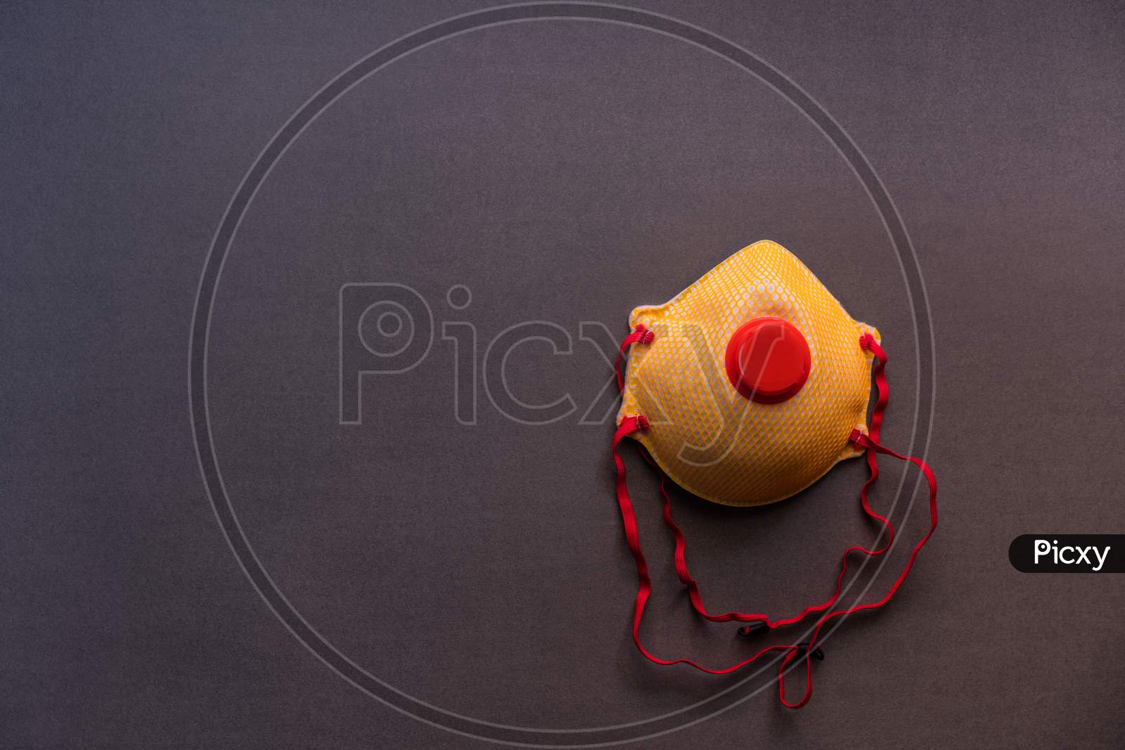 Top view of ffp2 respirator mask isolated on a grey background