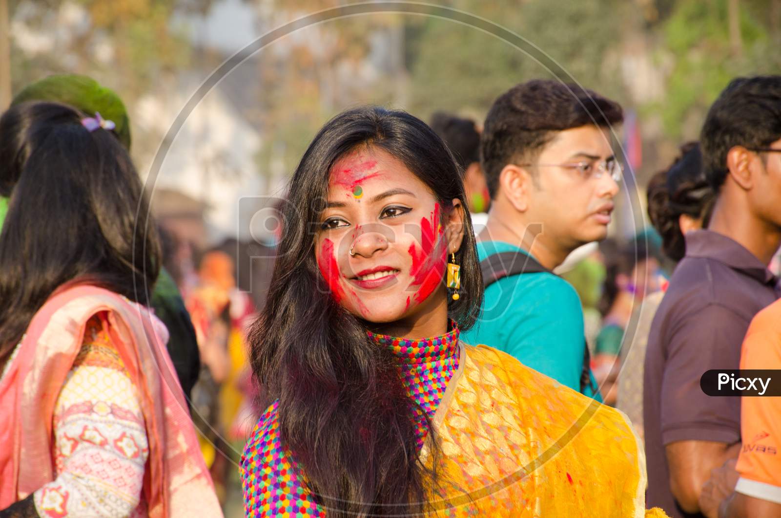 colourful candid portrait capture during holi festival