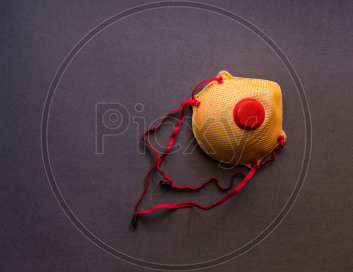 Top view of ffp2 respirator mask isolated on a grey background