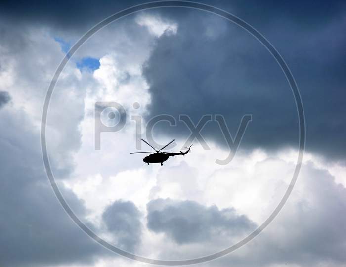 Helicopter flying on a cloudy day