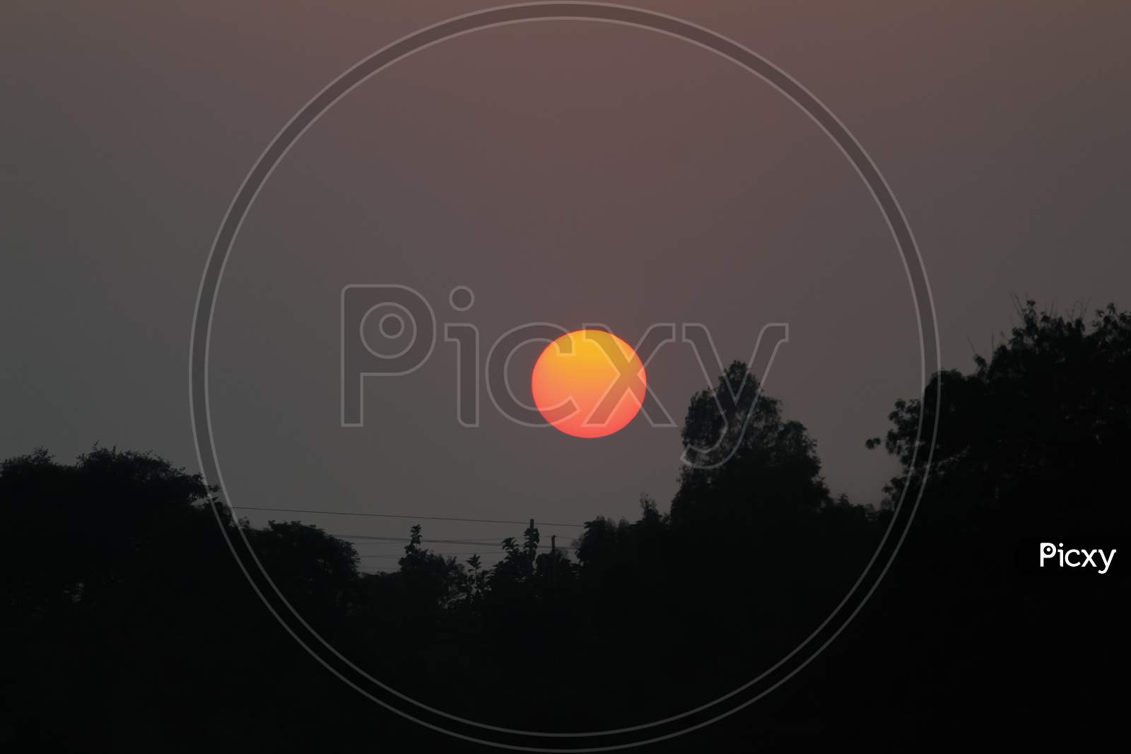 Sunset With Big Round Red Sun