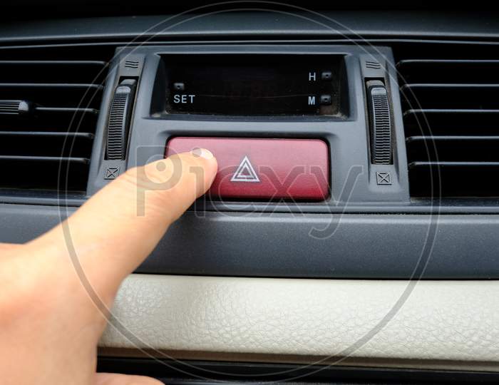 Index Finger Or Forefinger Pushing Car Red Emergency Stop Button Warning Safety Concept