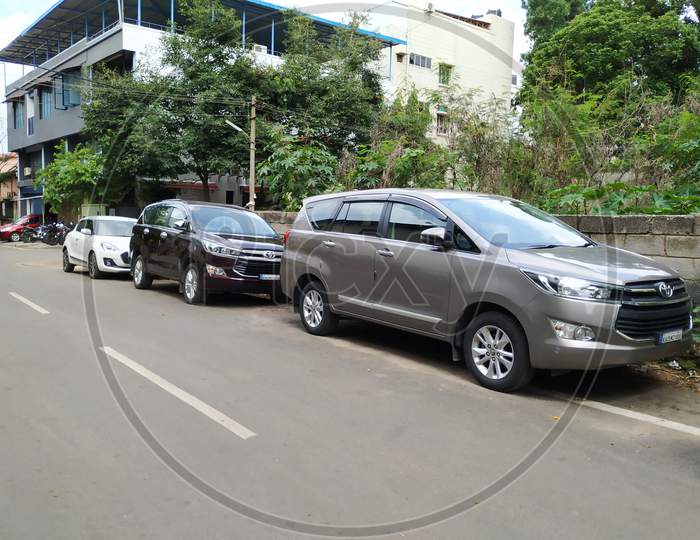 Closeup Of New Gray And Black Color Tata Altroz Car Parking On Asphalt Road
