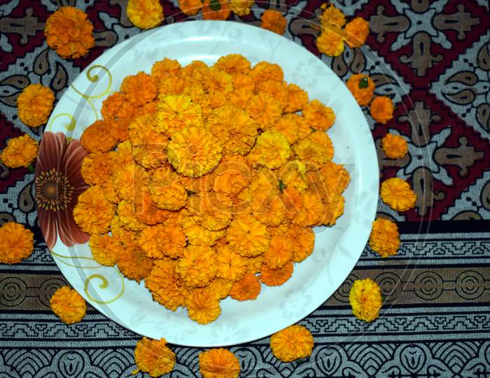 Beautiful Group Of Marigold Flower In Plate