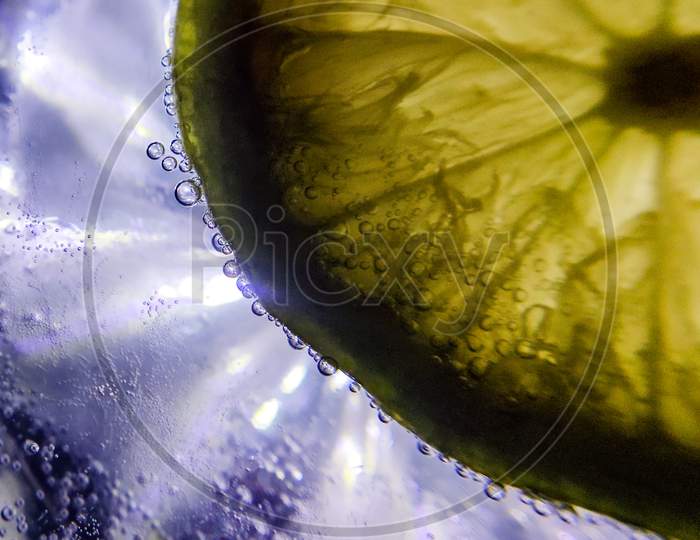 Slice lemon under water, macro photography