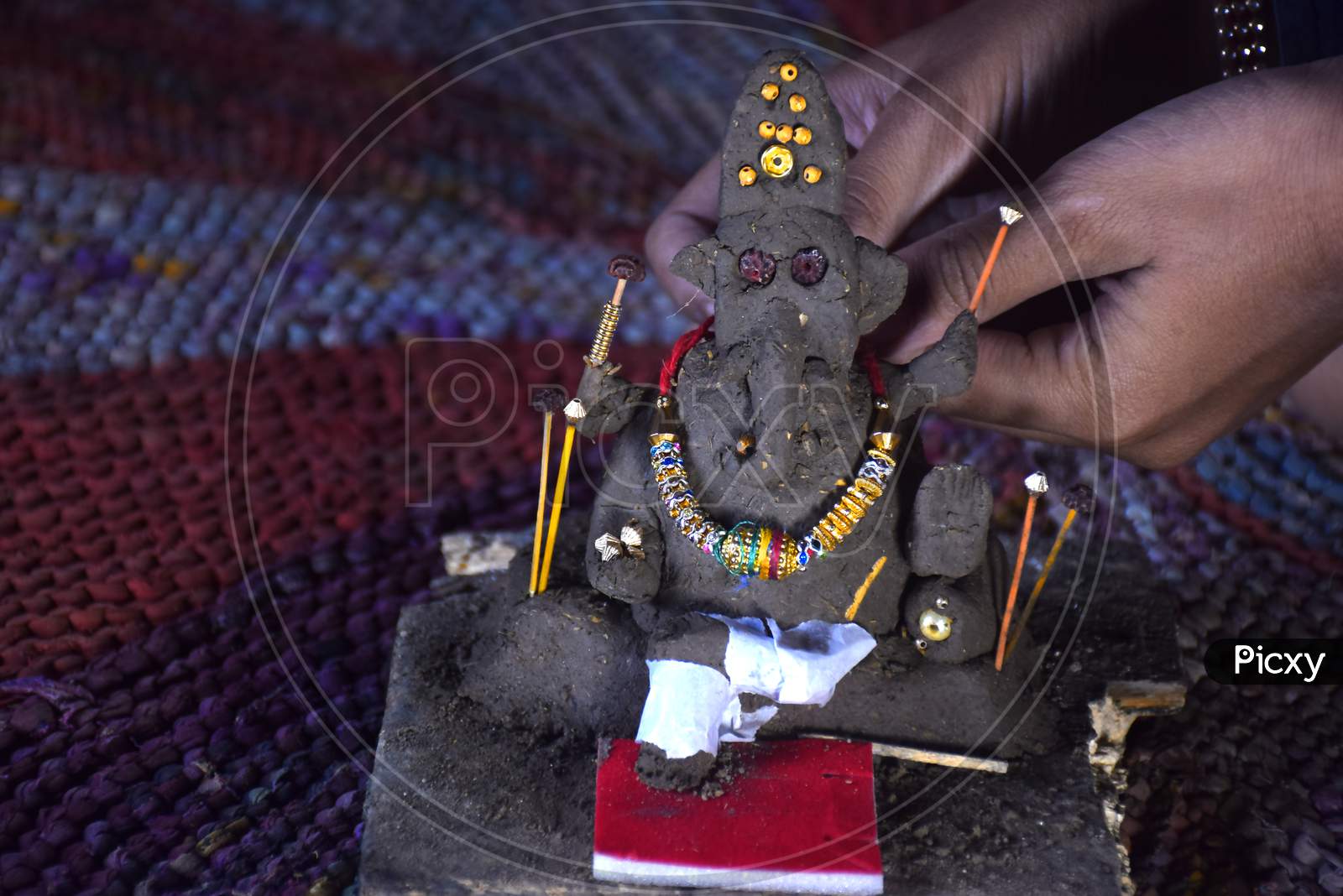 Lord Of Ganesha, Decorates Indian Boy, Made Of Clay