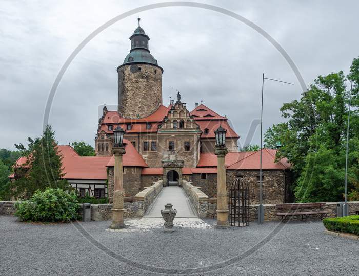 View Of The Front Of Czocha Castle On The Cloudy Evening.