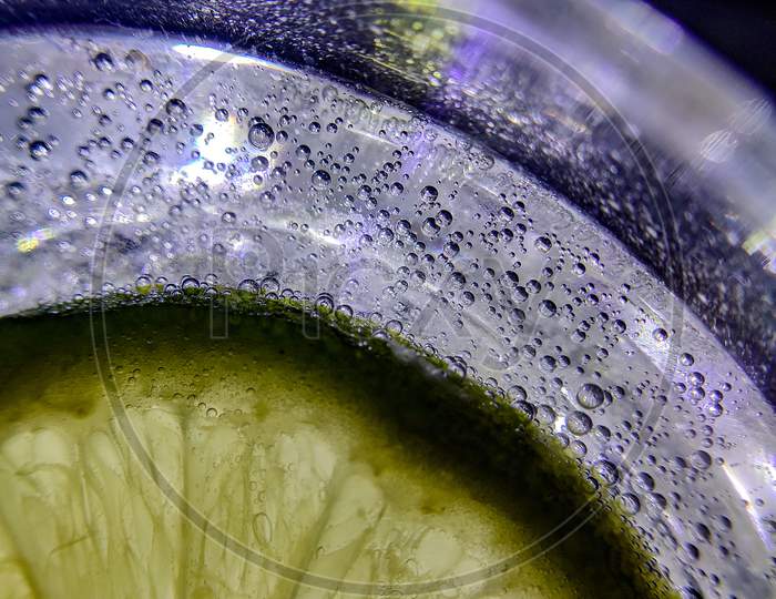 Slice lemon under water, macro photography