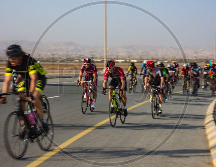 Muscat,Oman 15Th September 2017. Bicycle Racers Riding On The Road Racing Track To race