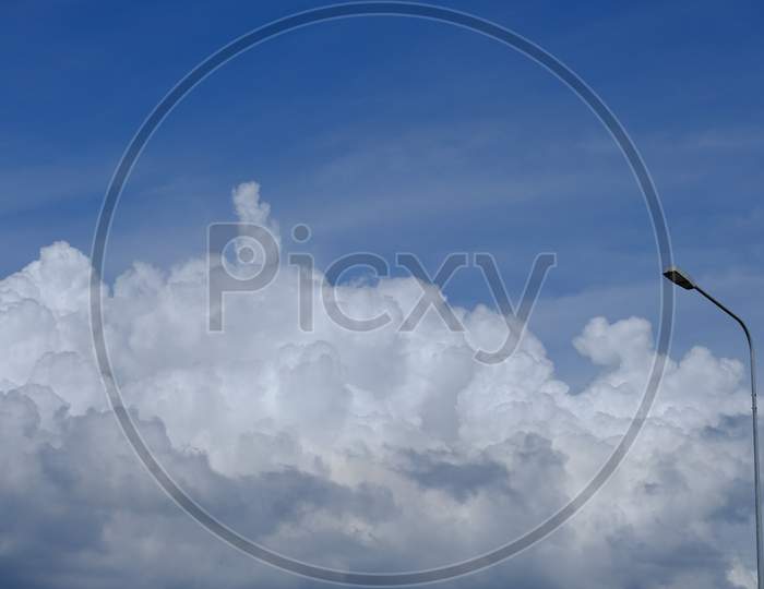 Isolated Street Light Lamppost With Blue Sky And Cloud, Calm Concept, Copy Space