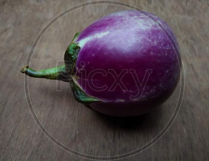 Eggplant on wooden background