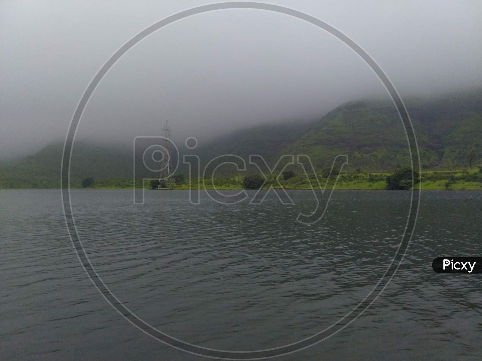 Landscape photography of water and fog
