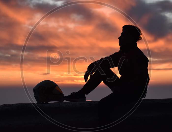 Beautiful Picture Of A Boy And Sunset Background
