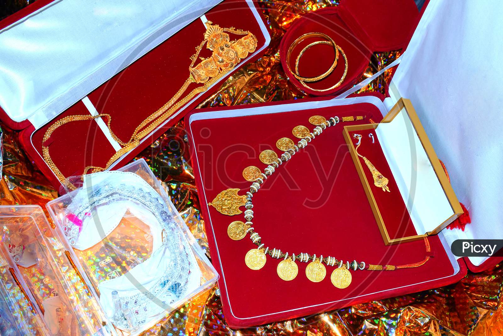 Gold And Silver Jewelery In Color Gift Box