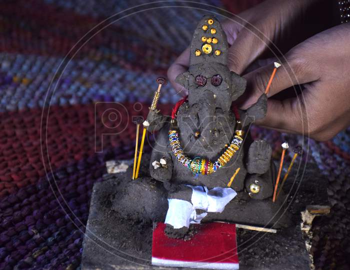 Lord Of Ganesha, Decorates Indian Boy, Made Of Clay