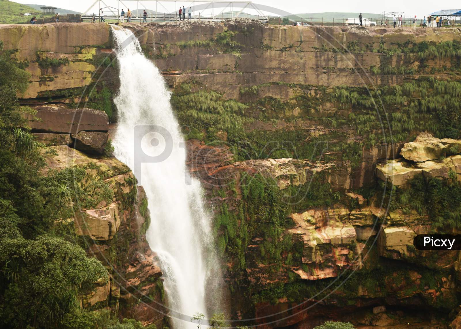 Dainthlen Falls And A Large Green Valley On The Mountain of Sohra or Cherrapunji In Meghalaya In India