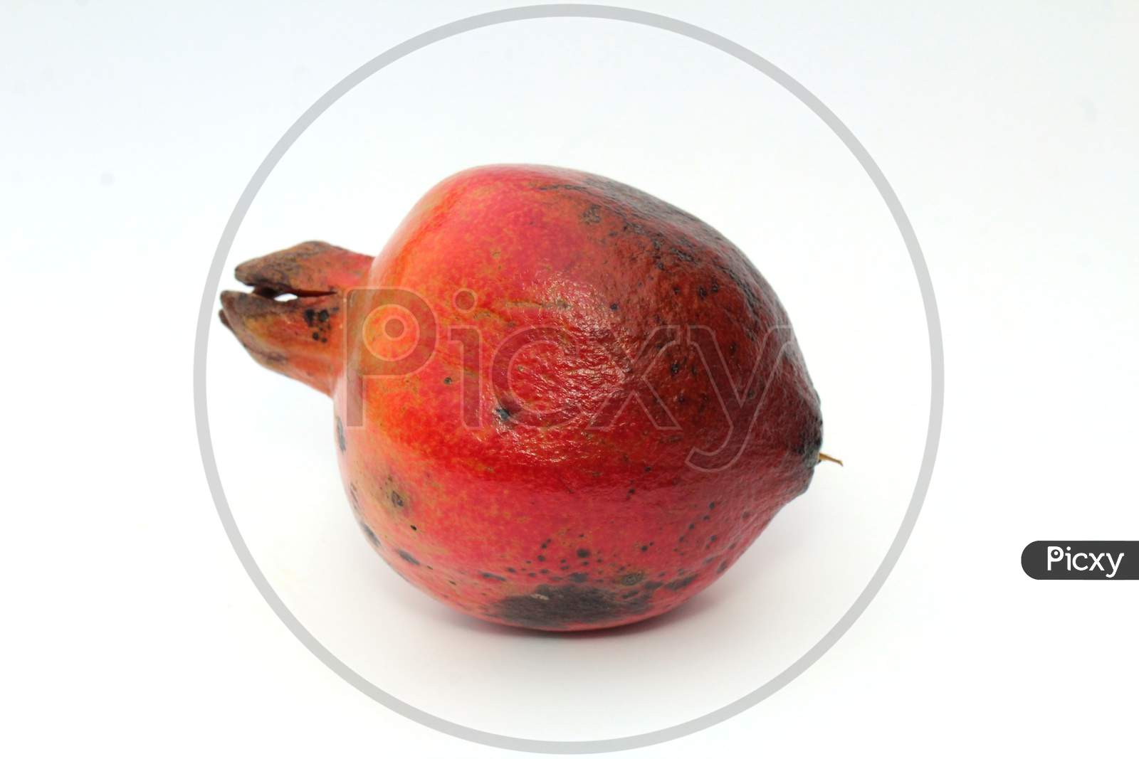 fresh healthy sweet pomegranate isolated on white background