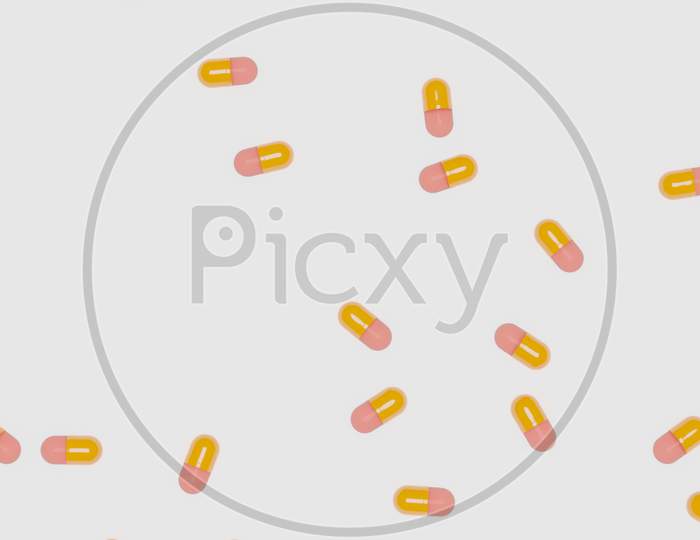 Capsules Are Spread On A White Background Surface