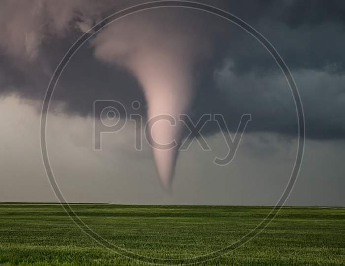 White Tornado Seen In Front Of Rozel City Of Kansas. Very Large Natural Disasters Are Also White With The Incorporation Of Wind From The Surroundings. Rolled Into A Single Large Wind Rotation.