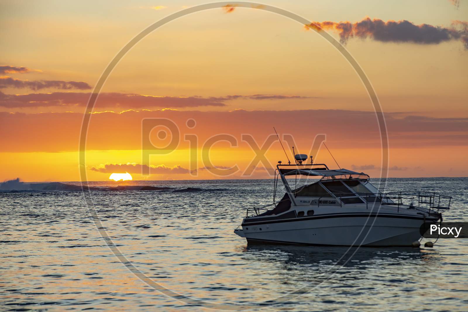 sailing boat during sunset.