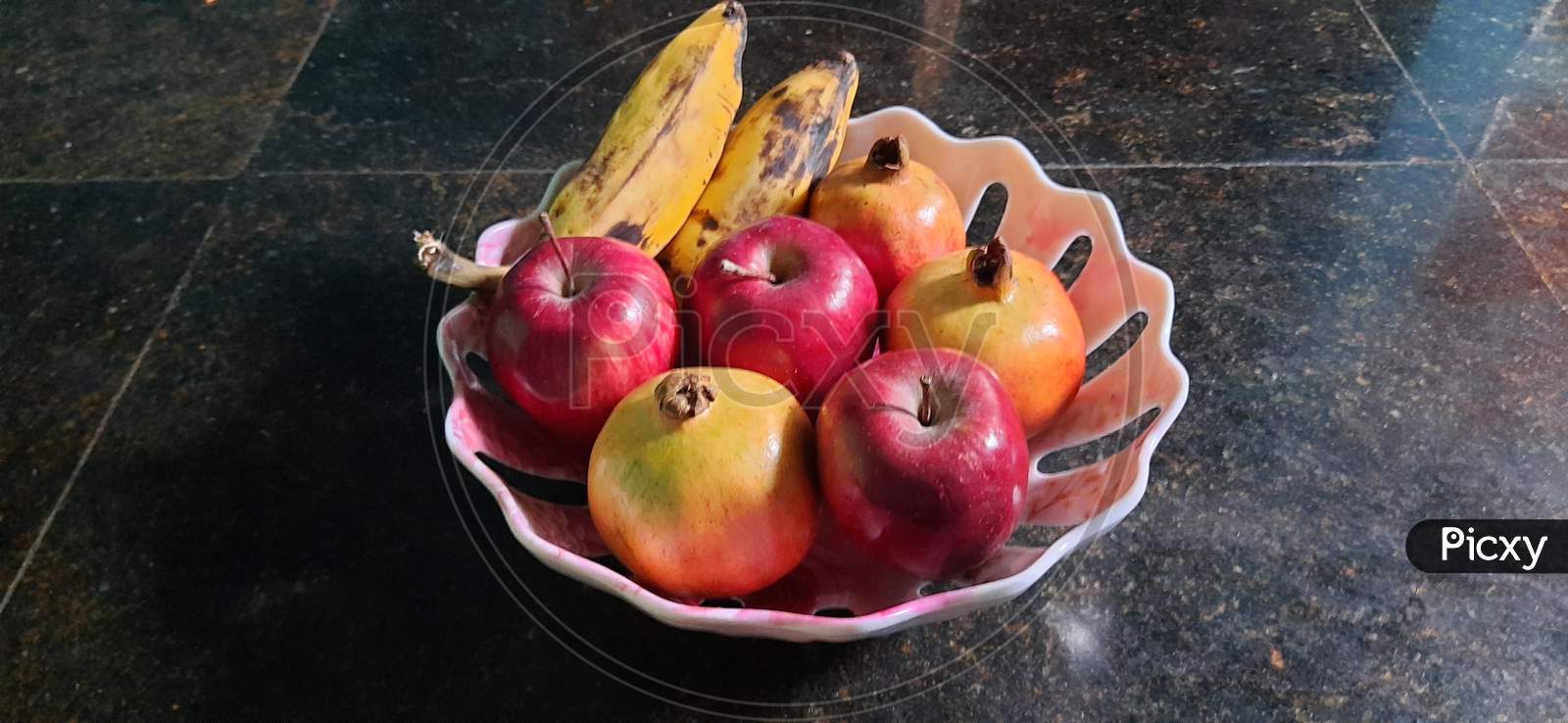 Fresh fruits in fruit basket