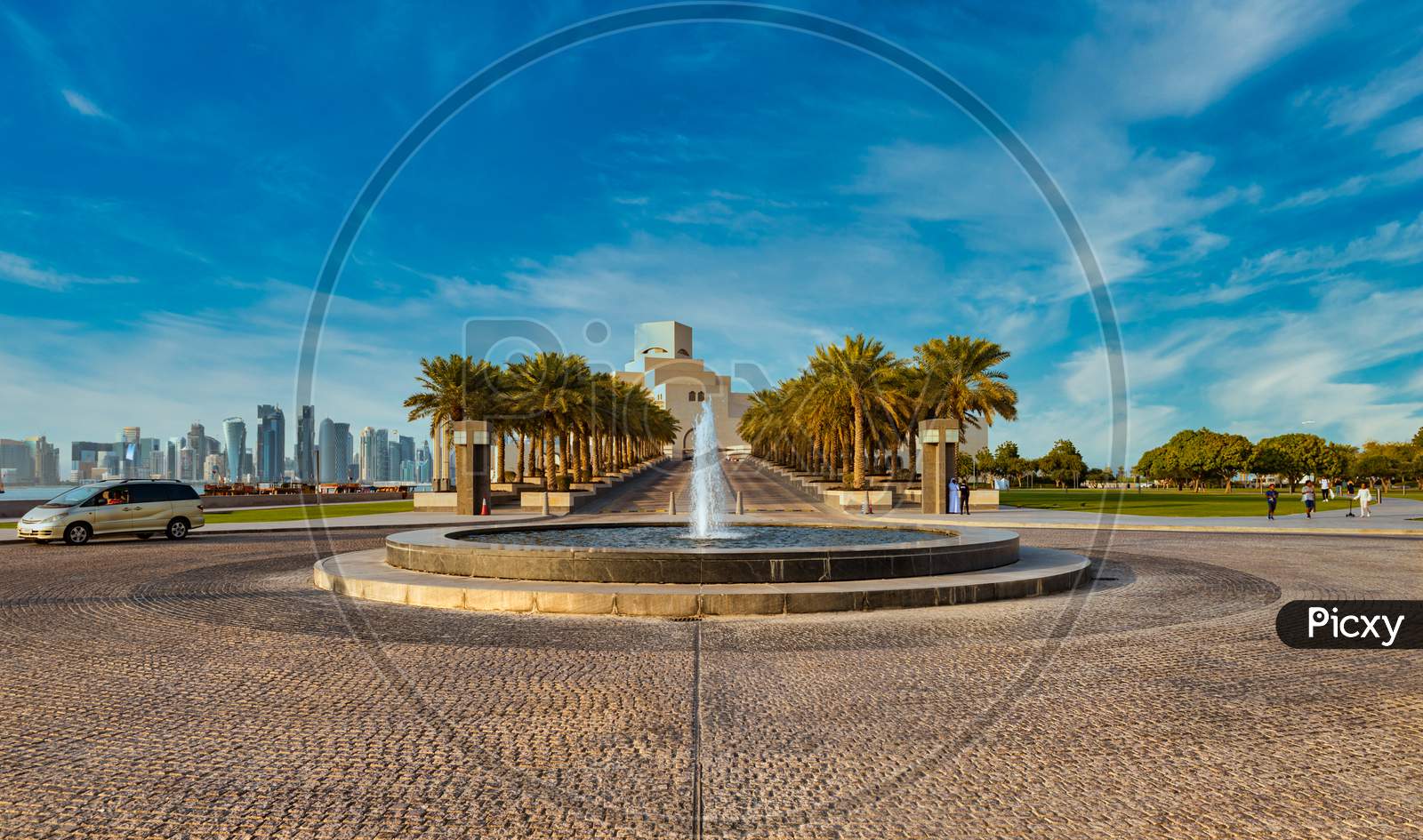 Doha cor niche  daylight view with museum of Islamic art and Doha skyline in background and fountain in foreground