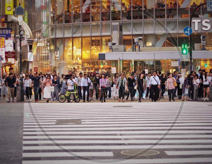 Shanghai - February 26 2020: Large Zebra Crossing Which Is Always Crowded By Many Pedestrians Who Want To Cross.
