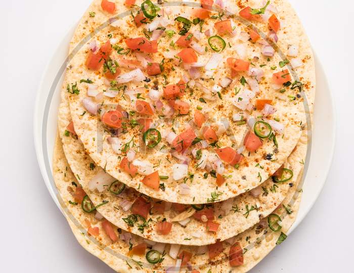 Indian Snack Masala Papad / Papadum, Fried Or Roasted With Spicy Onion And Tomato Salad