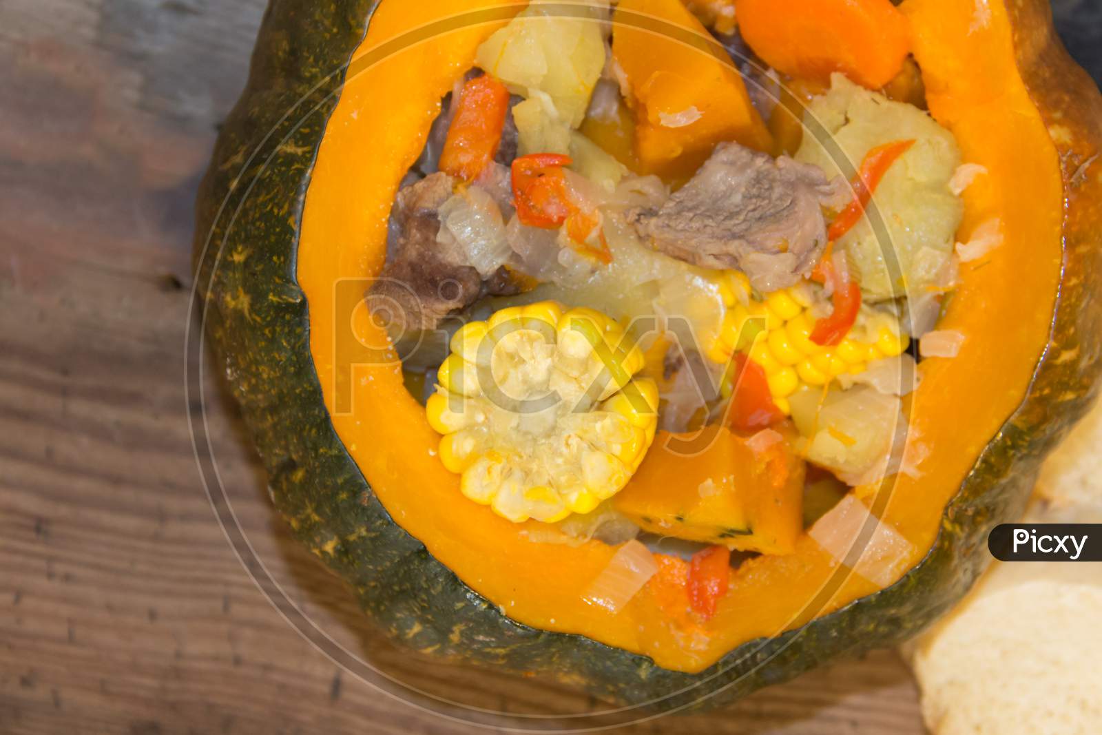 Carbonada Served In Pumpkin Typical Food Of The Argentine Gastronomy, Chile, Bolivia And Peru.