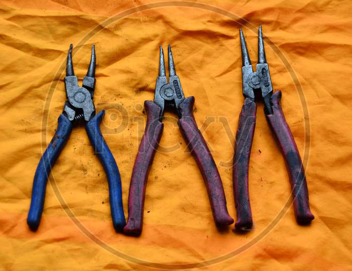 Electirical Plase Tool on Yellow Cloths Himachal Pradesh India