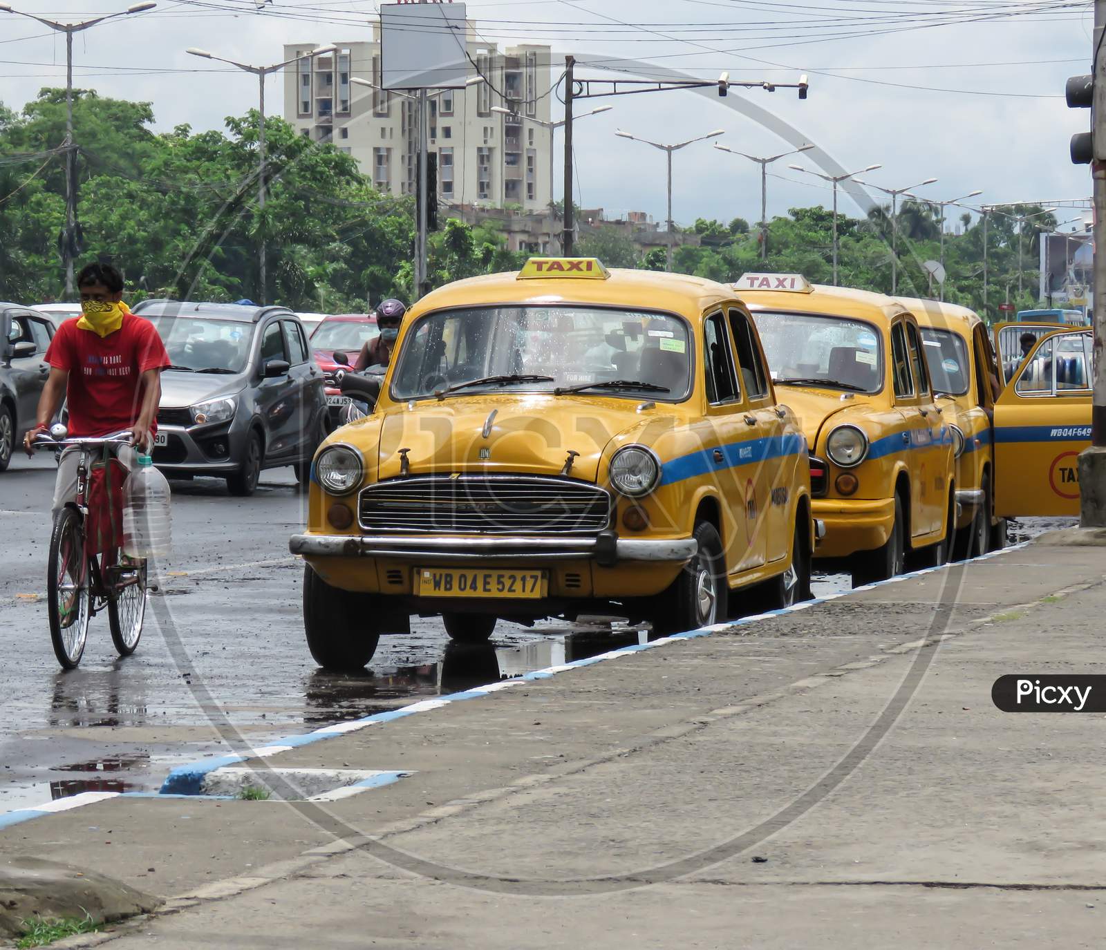Line Of Yellow Taxi At Road.