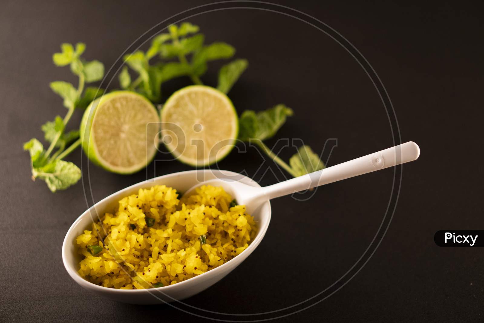 Indian breakfast poha in a bowl.