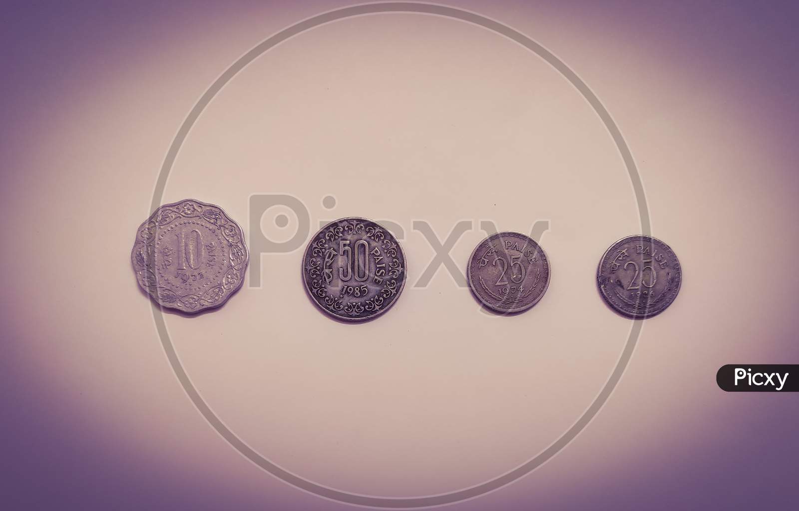 Collection of old indian currency coins which are no longer in circulation.