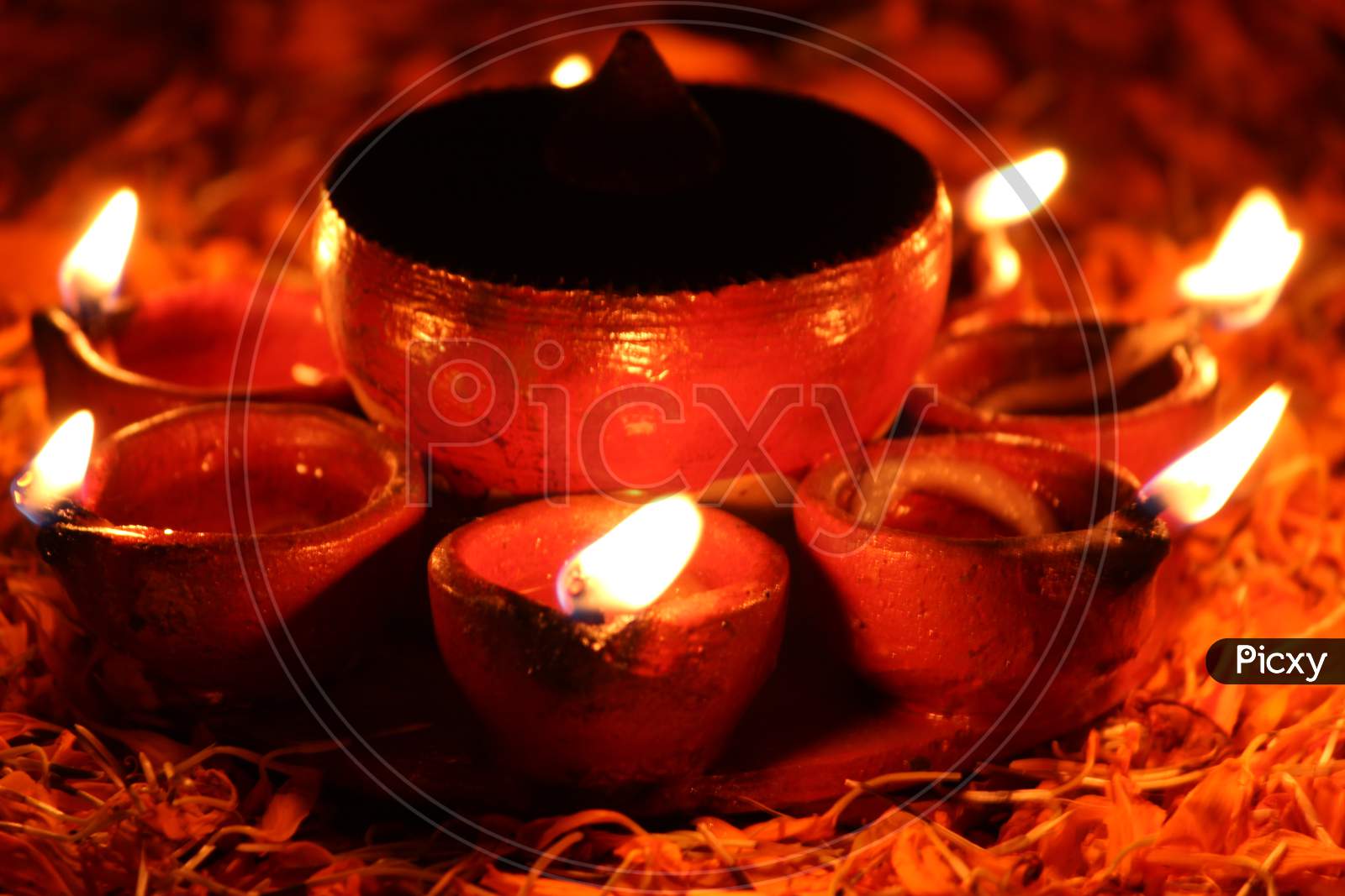 Multiple diya lighting in Diwali festival