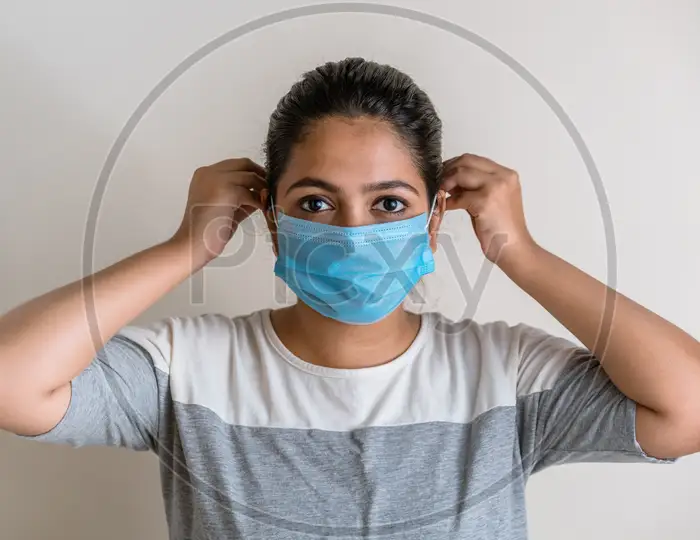 Download Image Of Indian Girl Wearing A Blue Surgical Mask Properly As A Precaution In The New Normal Lo416217 Picxy PSD Mockup Templates