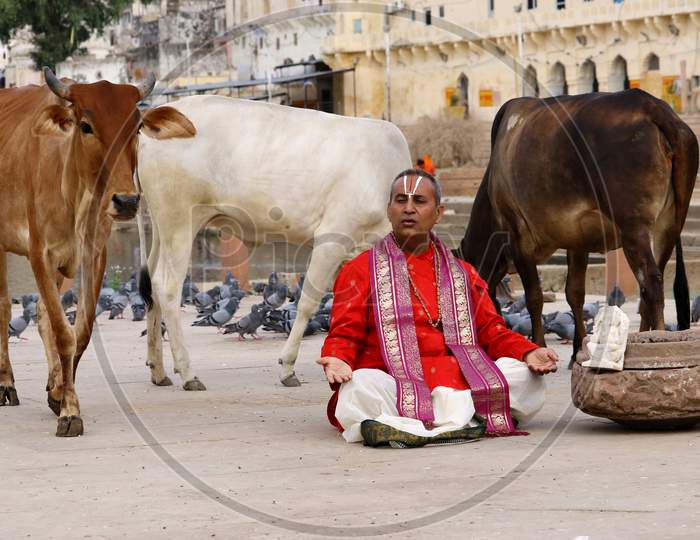 Hindu priest offer prayers on the occasion of "Guru Purunima" on the shores of the Holy Lake of Pushkar, Rajasthan on July 05, 2020