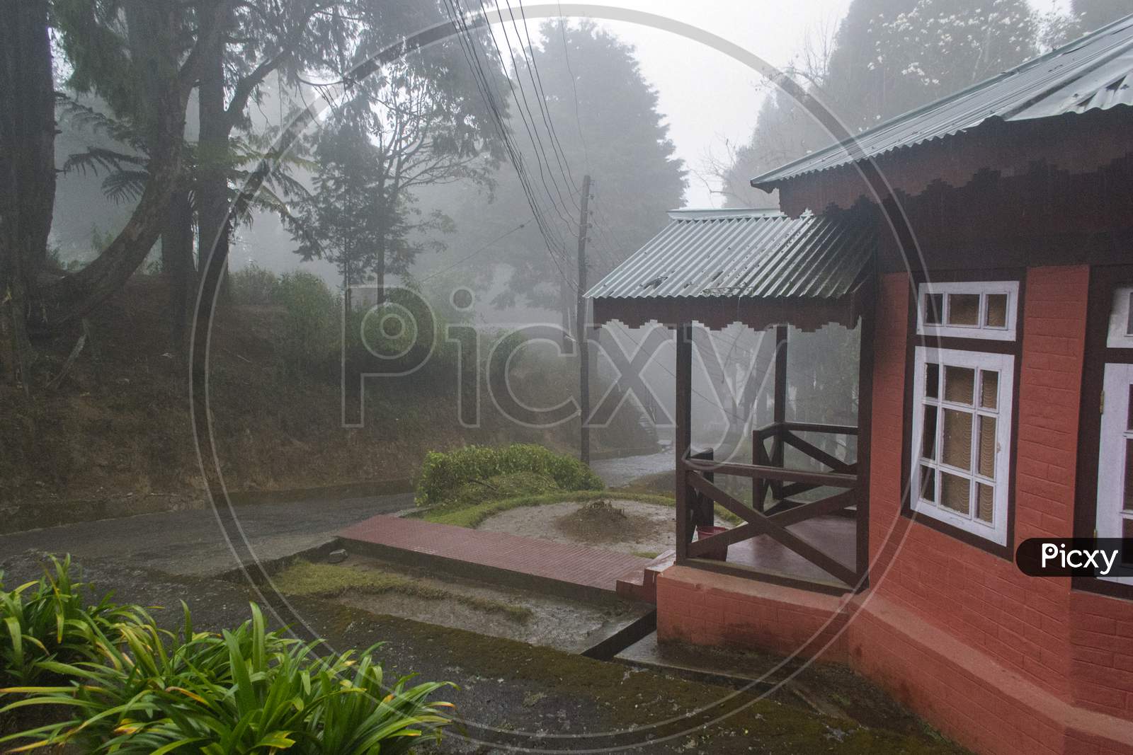 Misty And Fogy Morning With Beautiful Cottages
