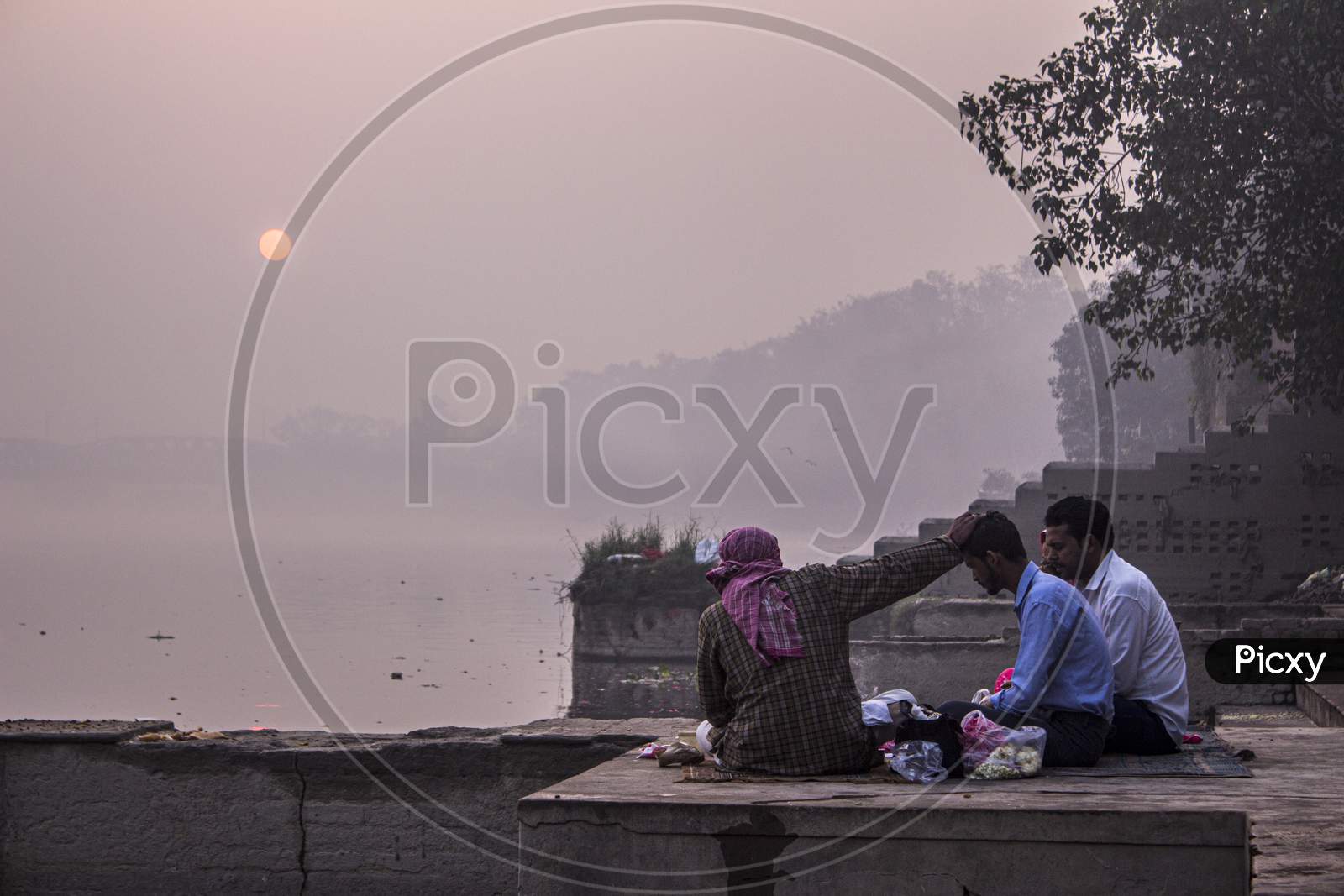 New Delhi, India - July 5 2018 : A Morning At Nigam Bodh Ghat Where People Are Parying To God Beside A River.