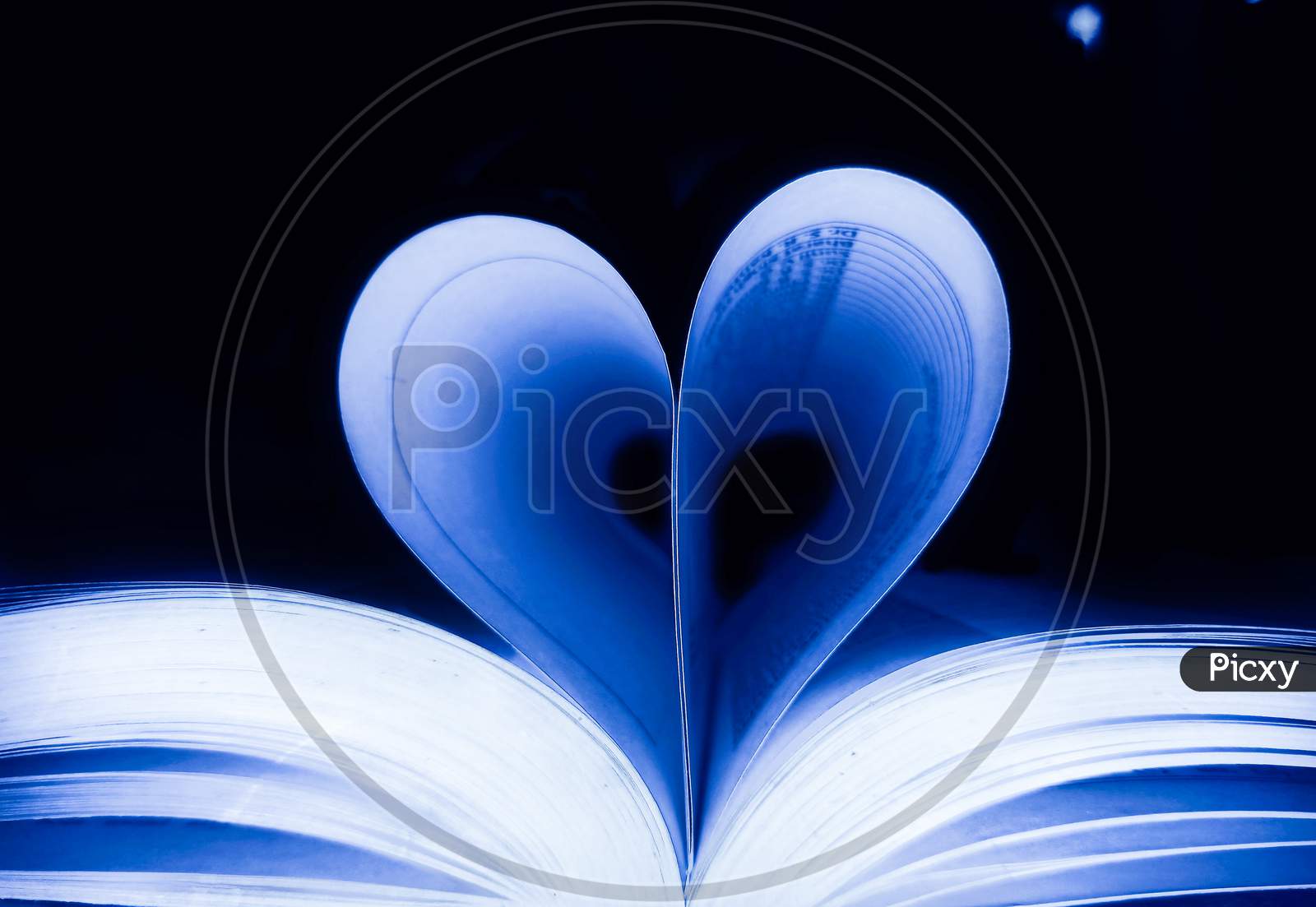 Image of Blue Heart,Heart shape or love symbol against pages of ...