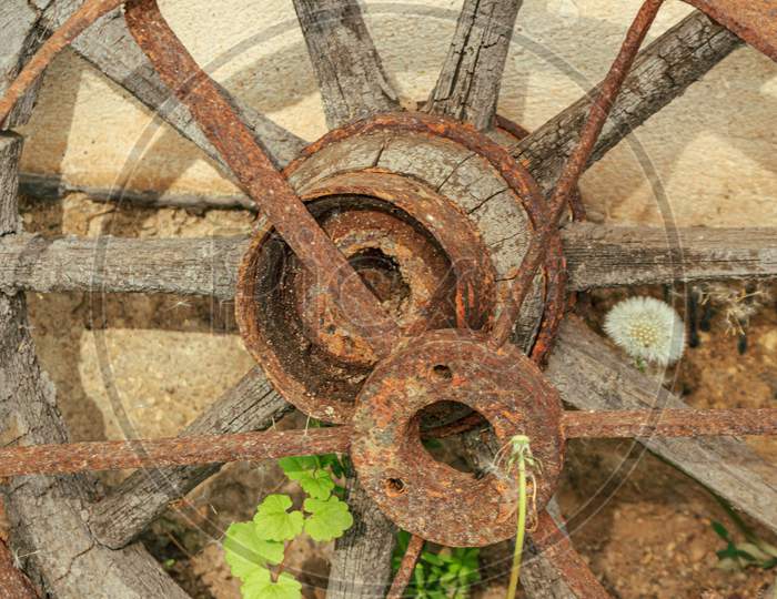 Old Rusted Wood And Metal Cart Wheel