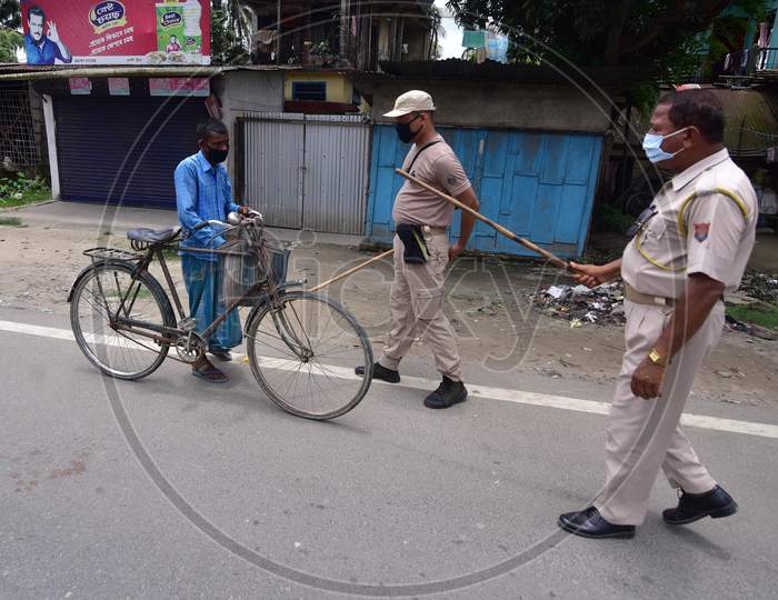 Police questioning a person  during the lockdown imposed to curb the spread of Coronavirus in Nagaon, Assam on July 05, 2020