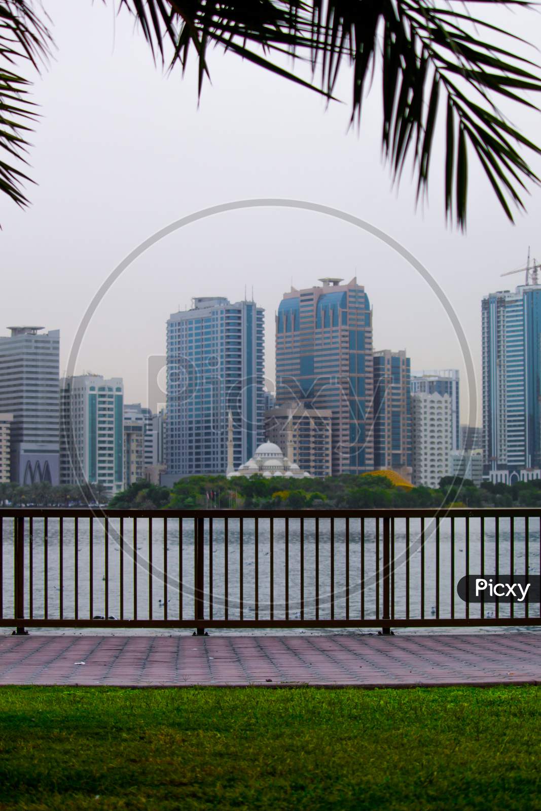 Landscape Of Al-Majaz Waterfront Sharjah And Al Noor Mosque With Other Architecture