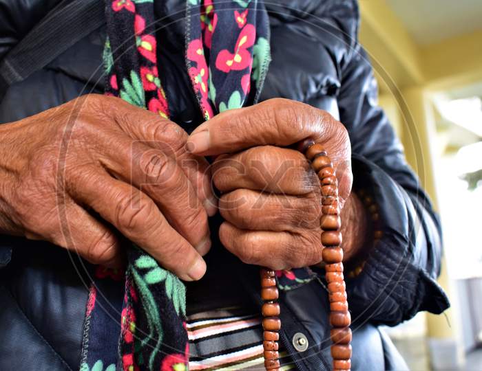 25 January 2019: Monk Holding Prayer Beads, Dalai Lama Temple, Dharamshala.