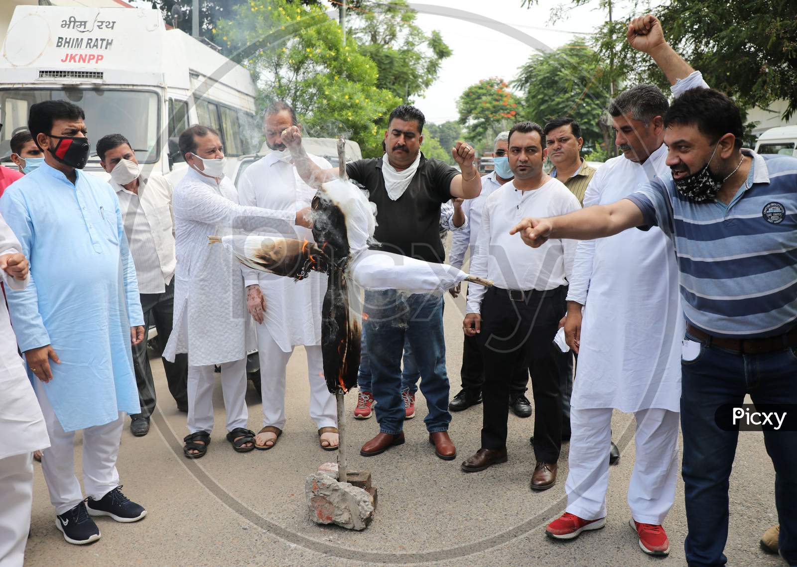 Jammu and Kashmir's National Panther Party workers burn an effigy of BJP party to restore 4G connection in Jammu on July 05, 2020
