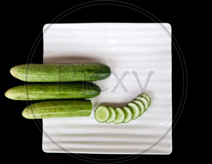 Fresh Raw Cucumber With Sliced Ones