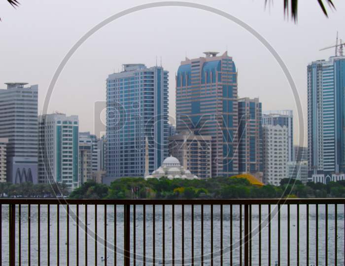 Landscape Of Al-Majaz Waterfront Sharjah And Al Noor Mosque With Other Architecture