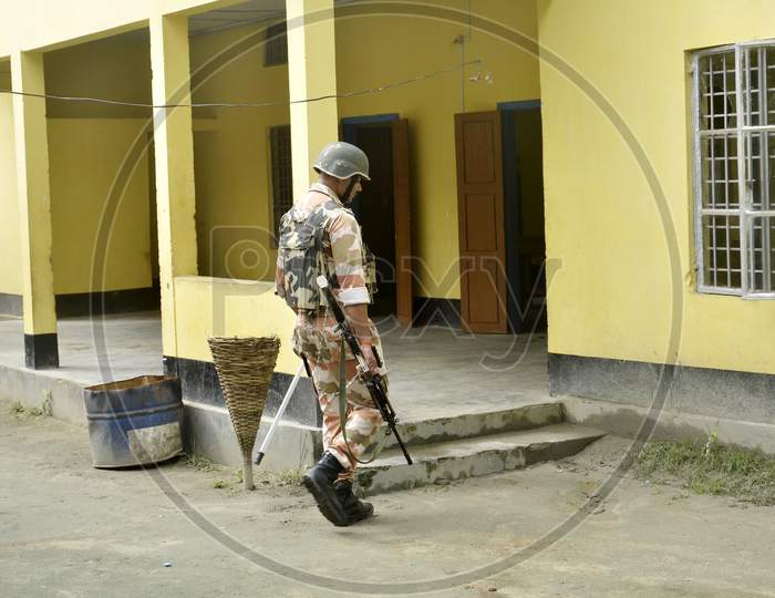 security personnel stand guard